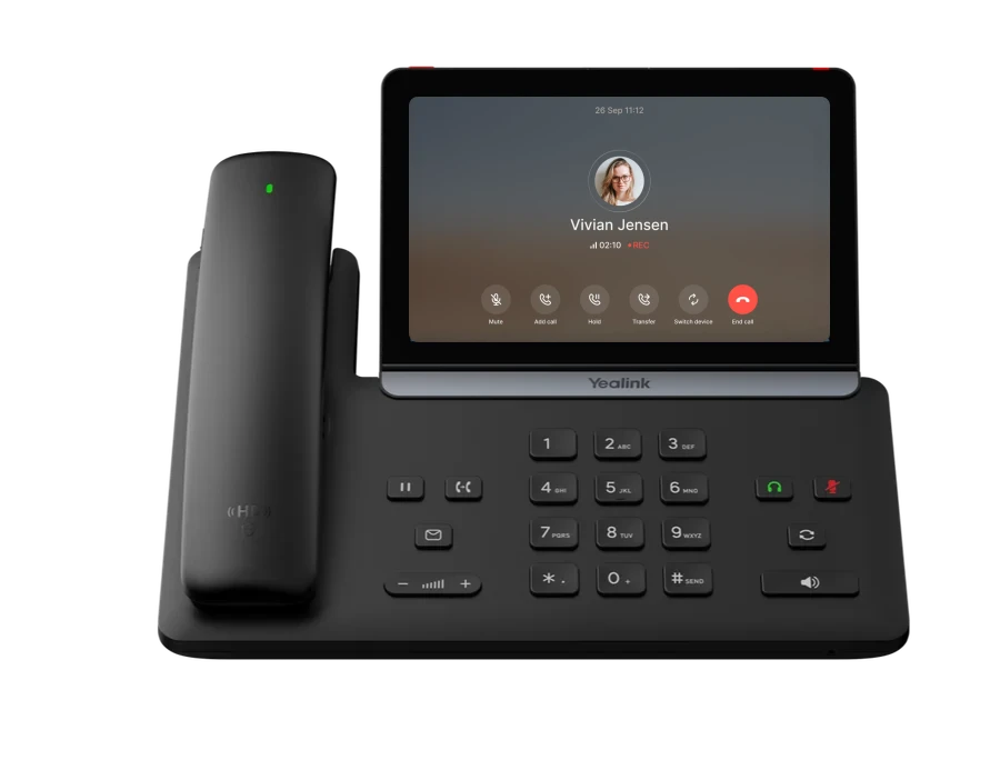 Olatti running on a Yealink desk phone, on a call with Vivian Jensen
